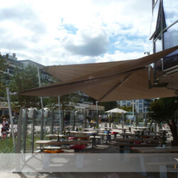 Sonnensegel über Restaurant-Terrasse in Scharbeutz Sonnensegel über Restaurant-Terrasse vor der Rotunde am AHOI -steffen henssler- in Scharbeutz / Ostsee